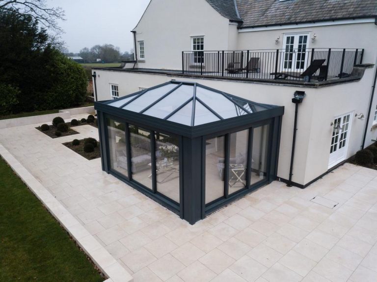 A {glass conservatory} in Bishop's Cleeve.